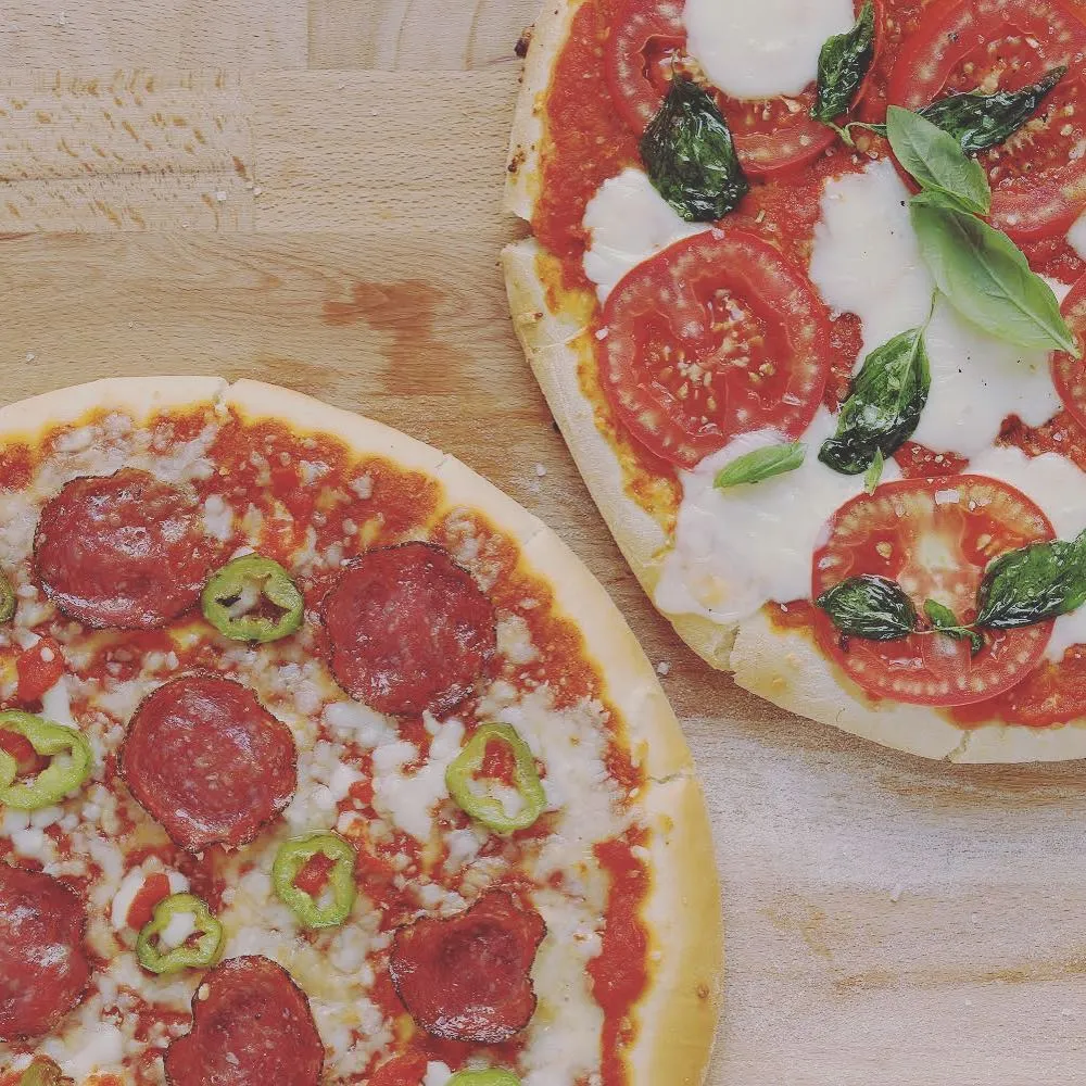Cheese pizza with fresh basil and mozzarella at Strathcona Pizza Edmonton